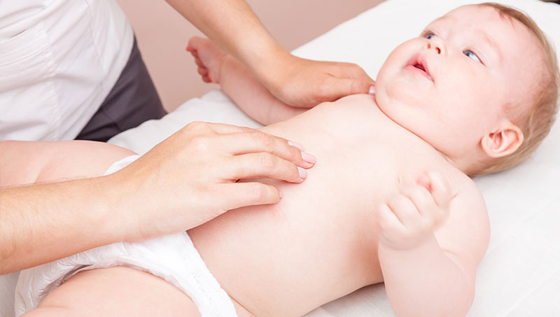 Infant receiving chiropractic care for colic