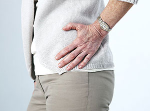 Woman suffering with hip pain